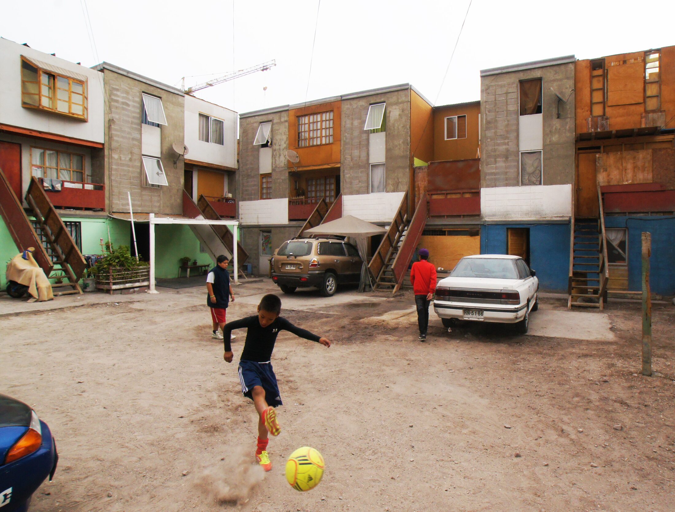 Exterior view of Quinta Monroy with resident-led adaptations
